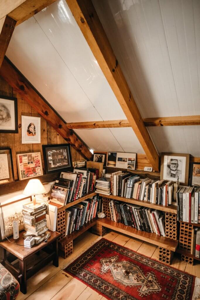Small library in attic with lots of books